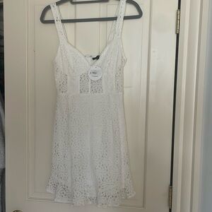 Papermoon White mini dress with floral pattern size: small NEW